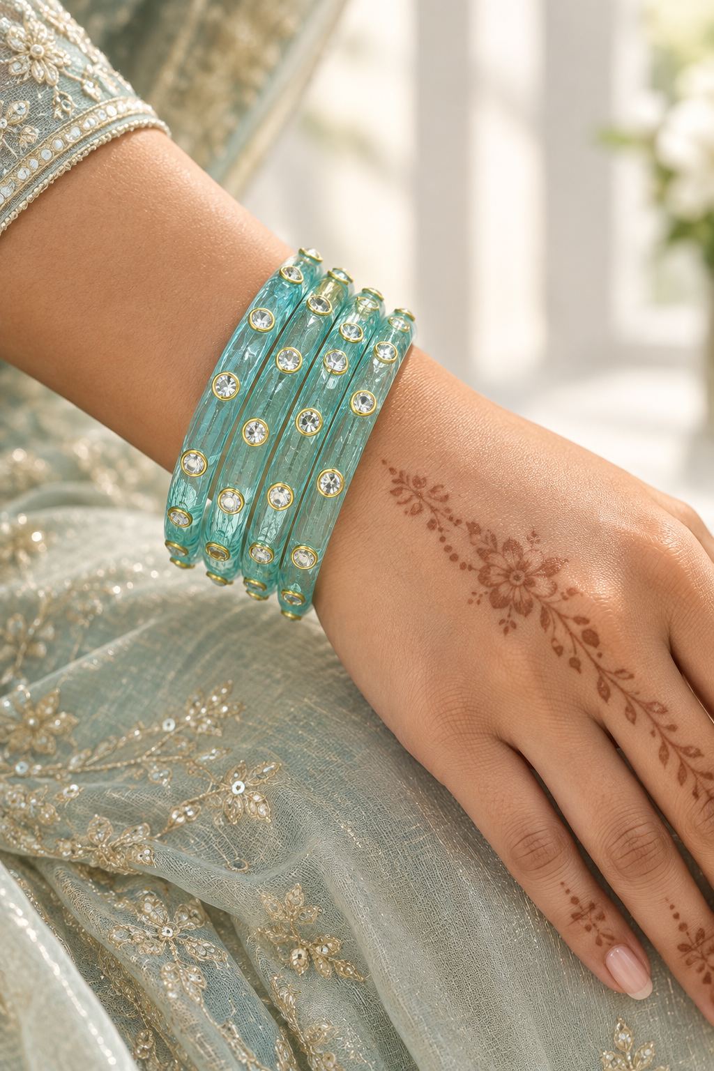 Sky Aqua kundan glass bangles worn on a henna hand
